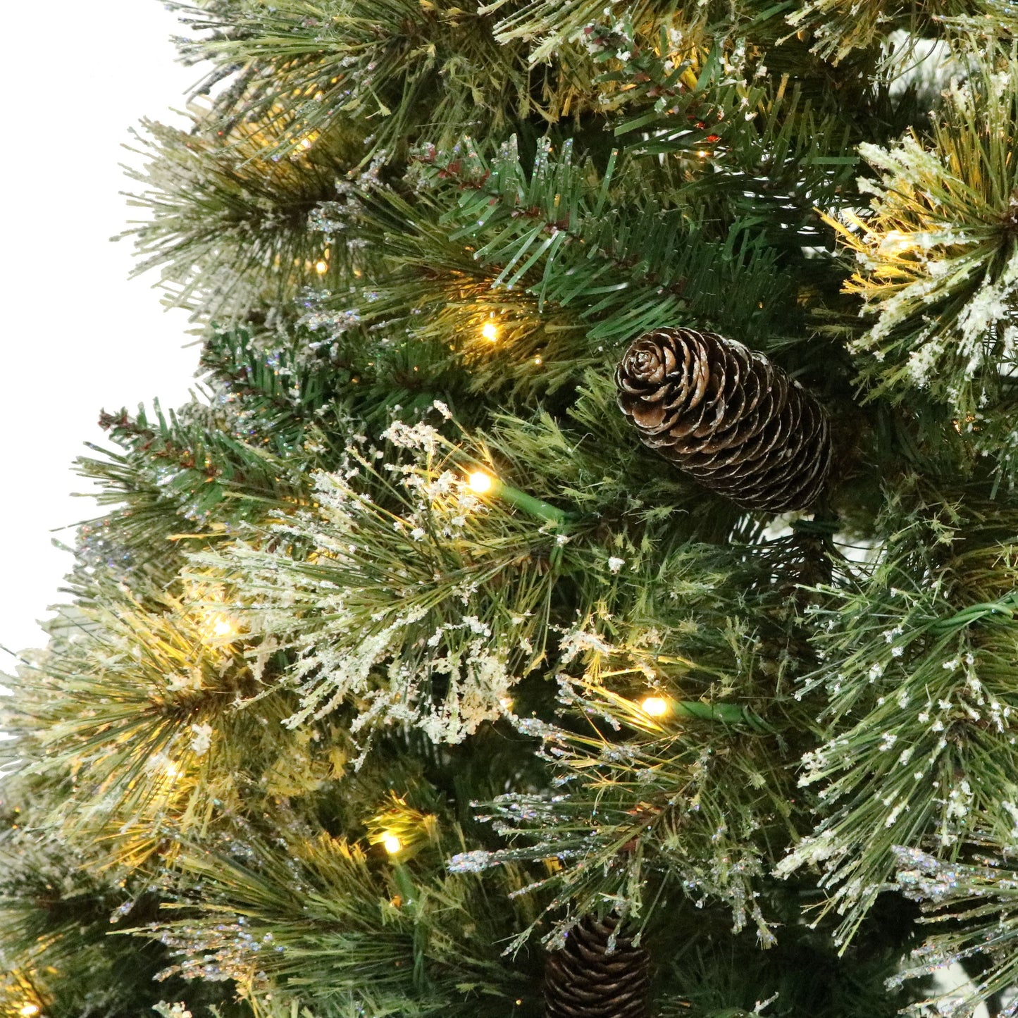 Meris 7.5 ft Brilste Mixed Hinged Christmas Tree with Snow, Glitter, 86 Frosted Pine Cones and 750 Clear LED Lights