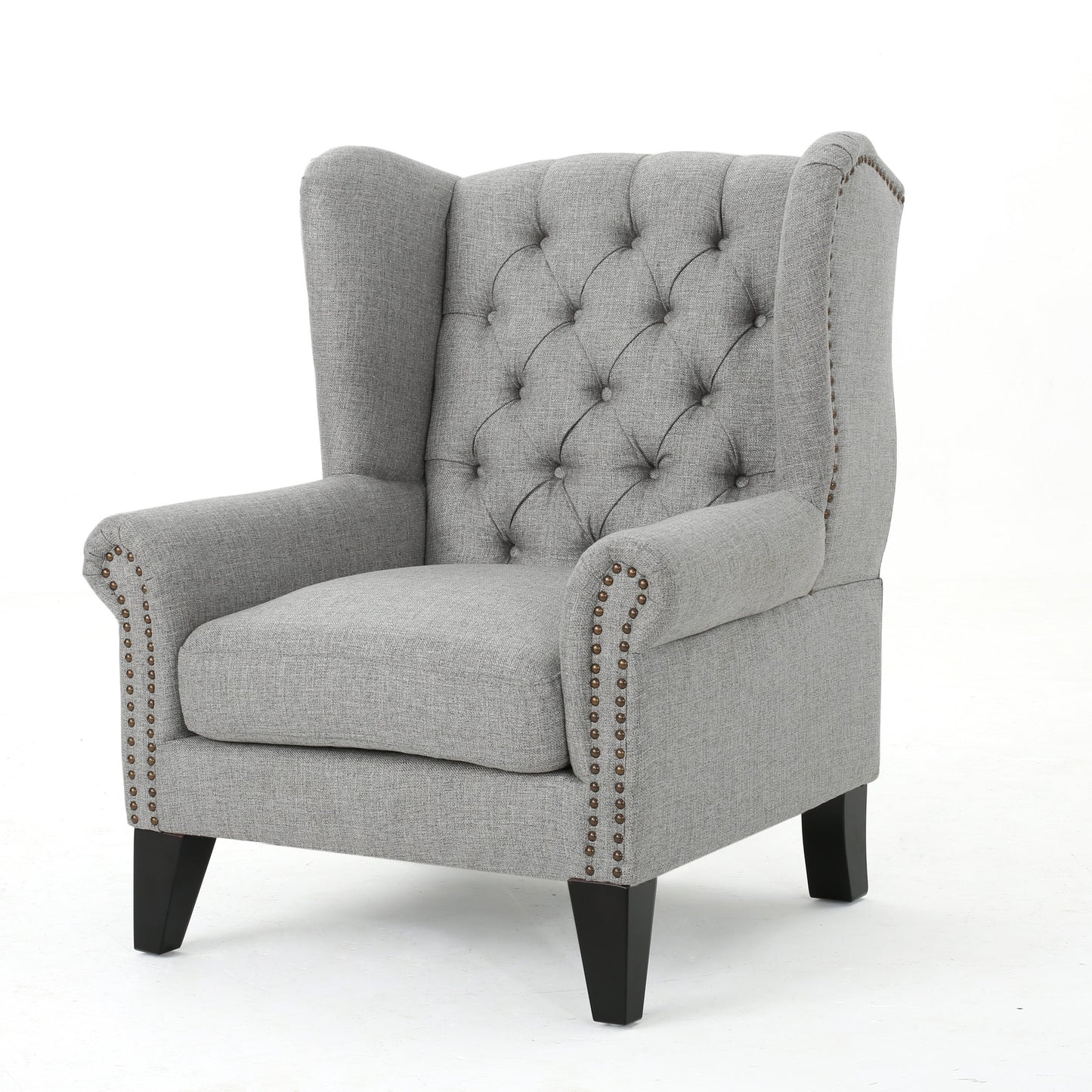 Cerebral Upholstered Wingback Chair with Diamond Tufting and Nailhead Trim