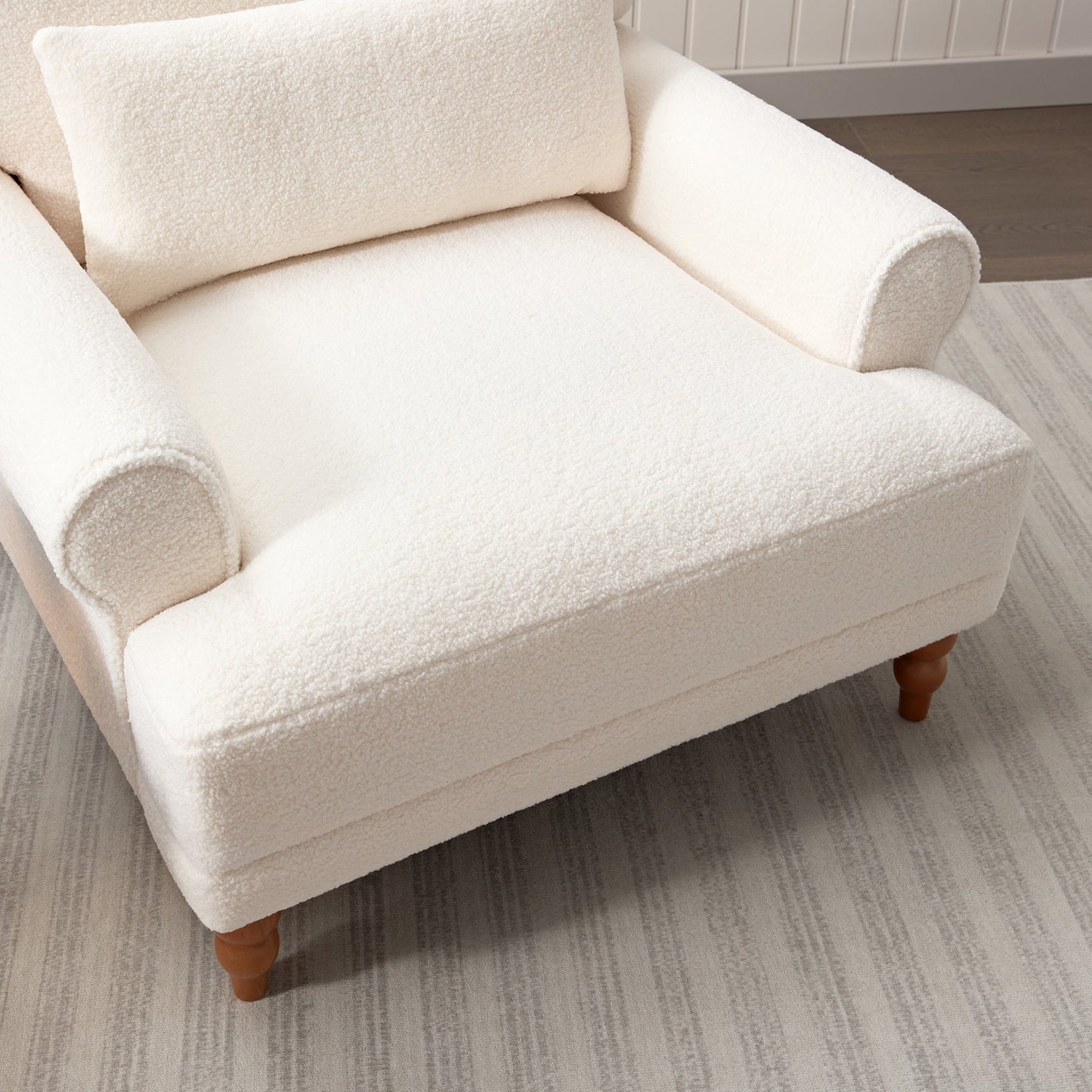 Upholstered Accent Chair with Circular Armrests and Roman Column Legs