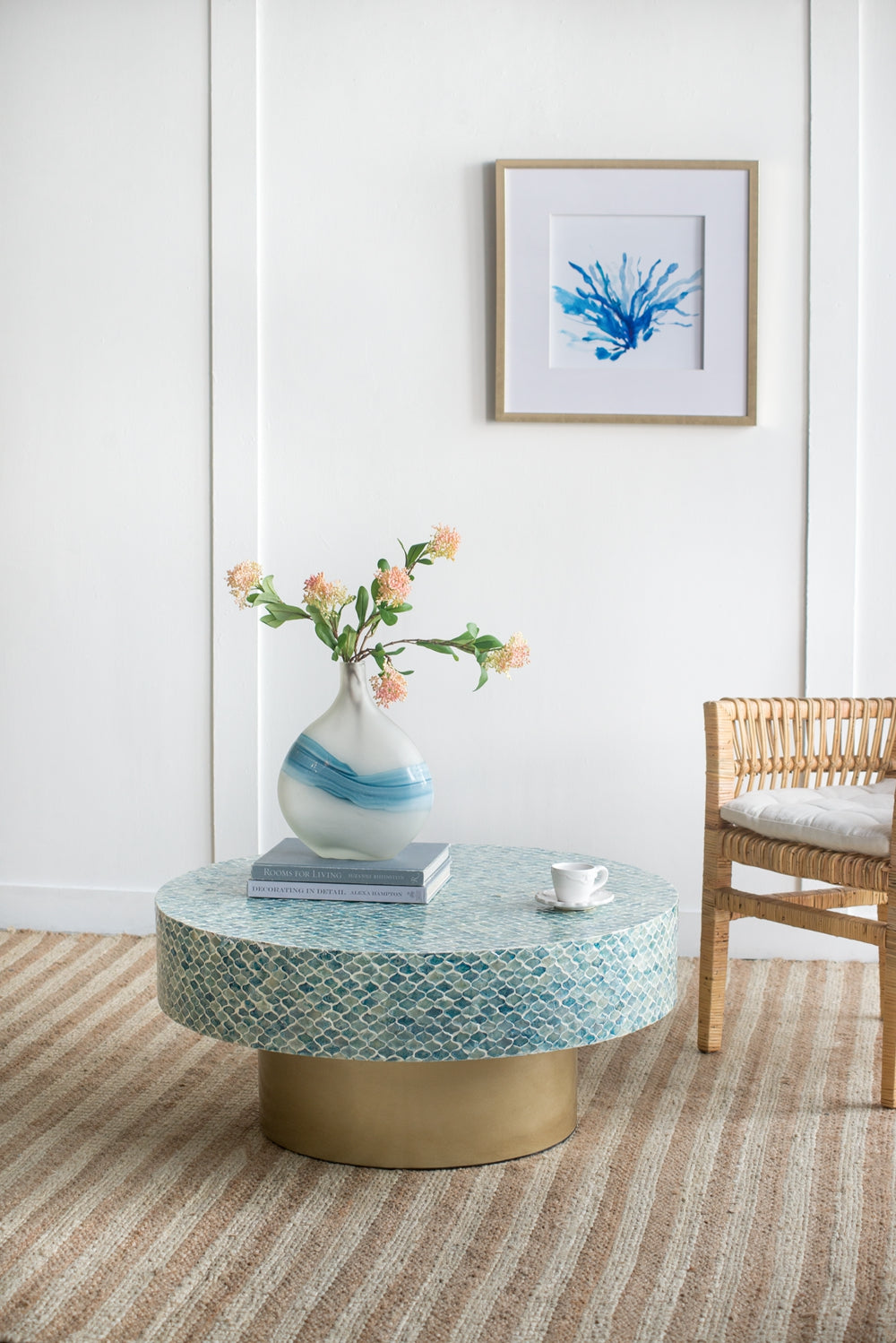 Alacrits Round Coffee Table with Capiz Design and Pedestal Base