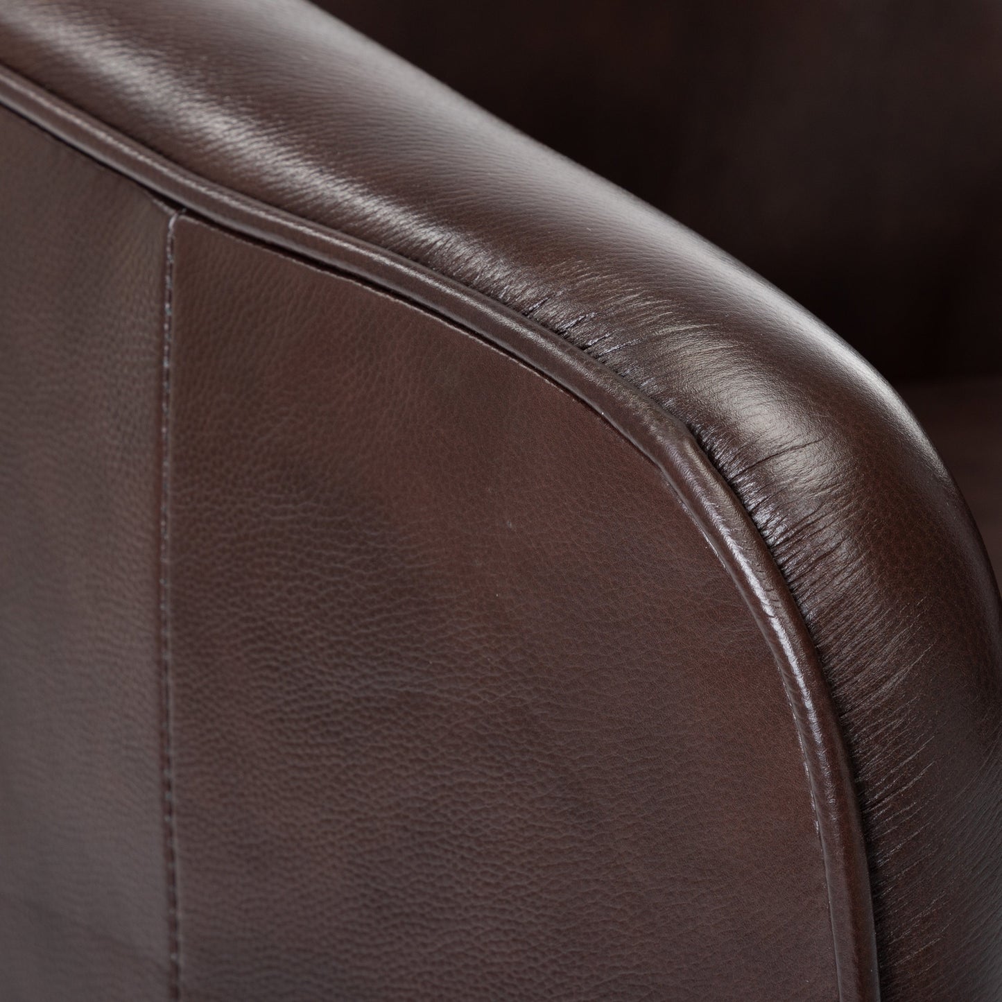 Leather Swivel Chair with Sloped Arms and Barrel Design