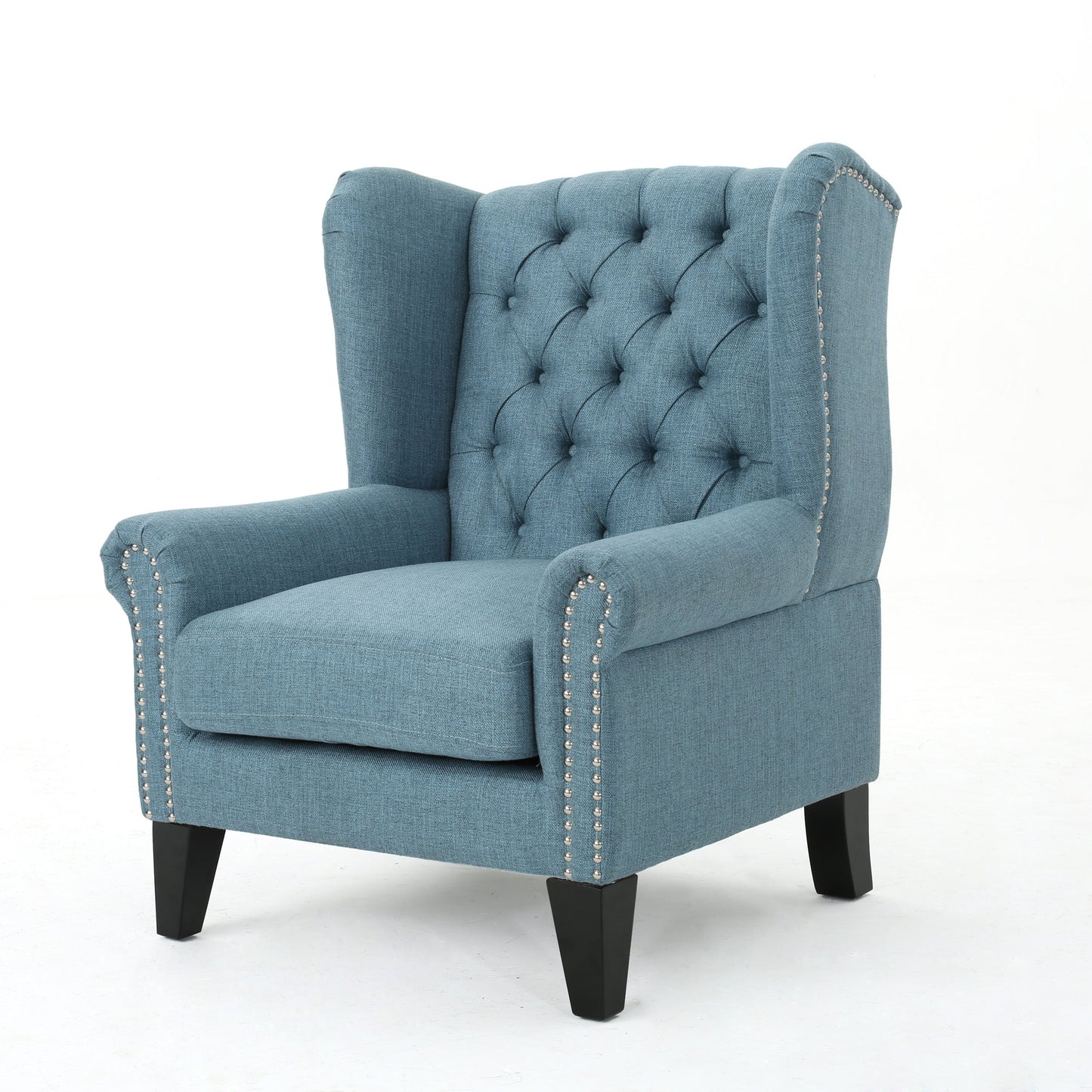 Cerebral Upholstered Wingback Chair with Diamond Tufting and Nailhead Trim