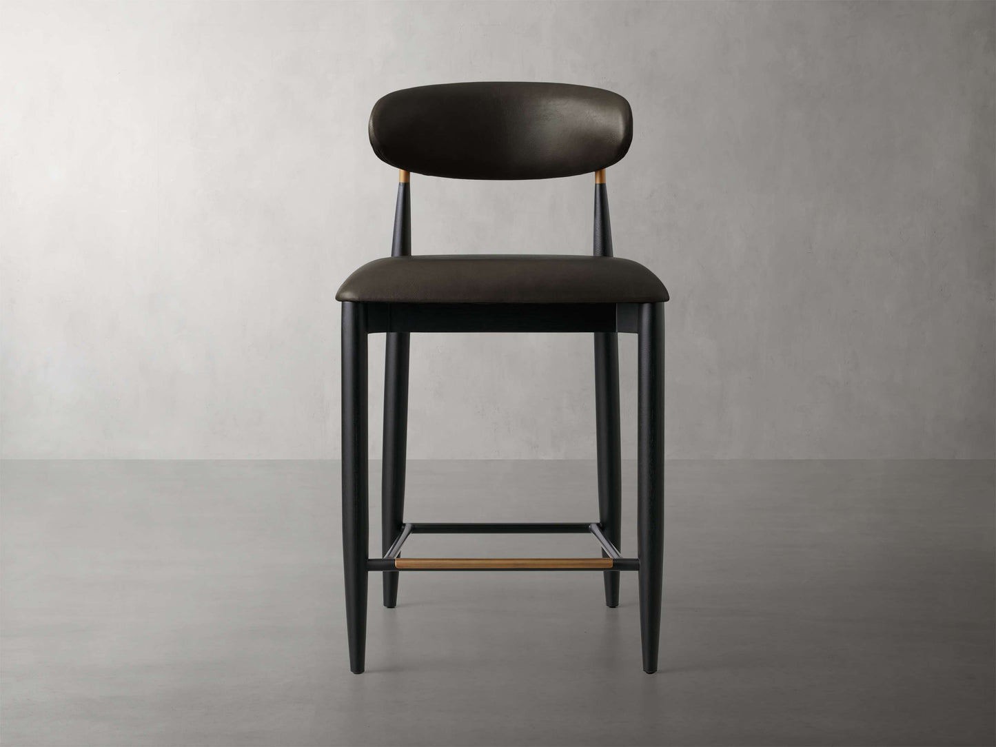 Jagger Faux Leather Armless Stool in Black with Antique Brass
