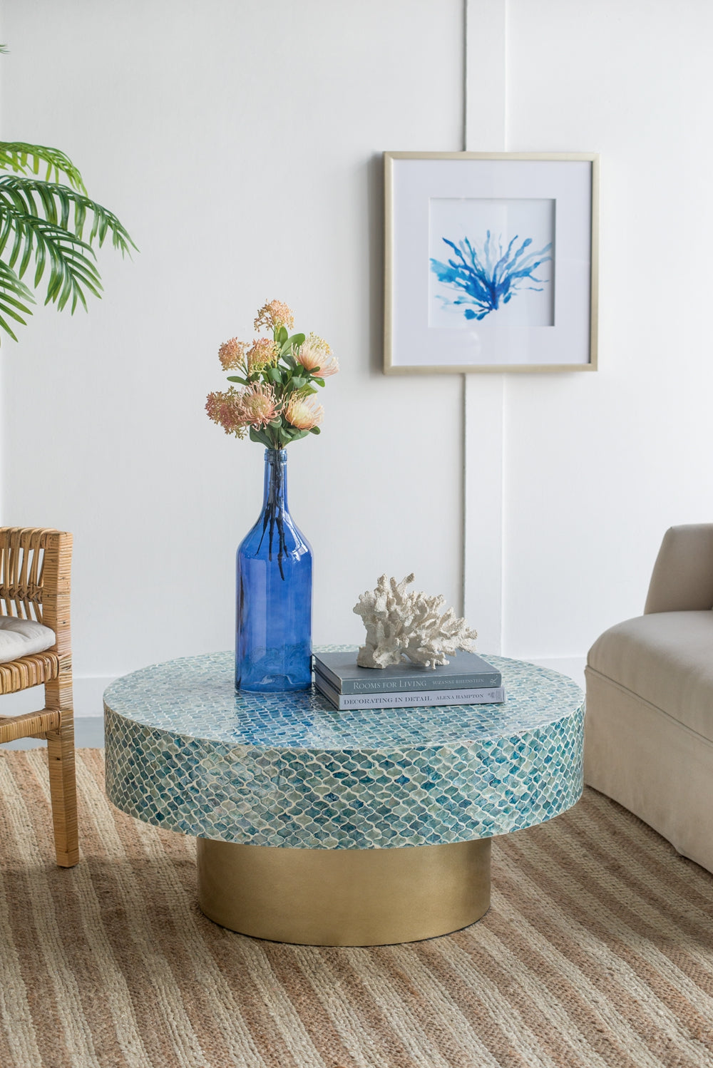 Alacrits Round Coffee Table with Capiz Design and Pedestal Base
