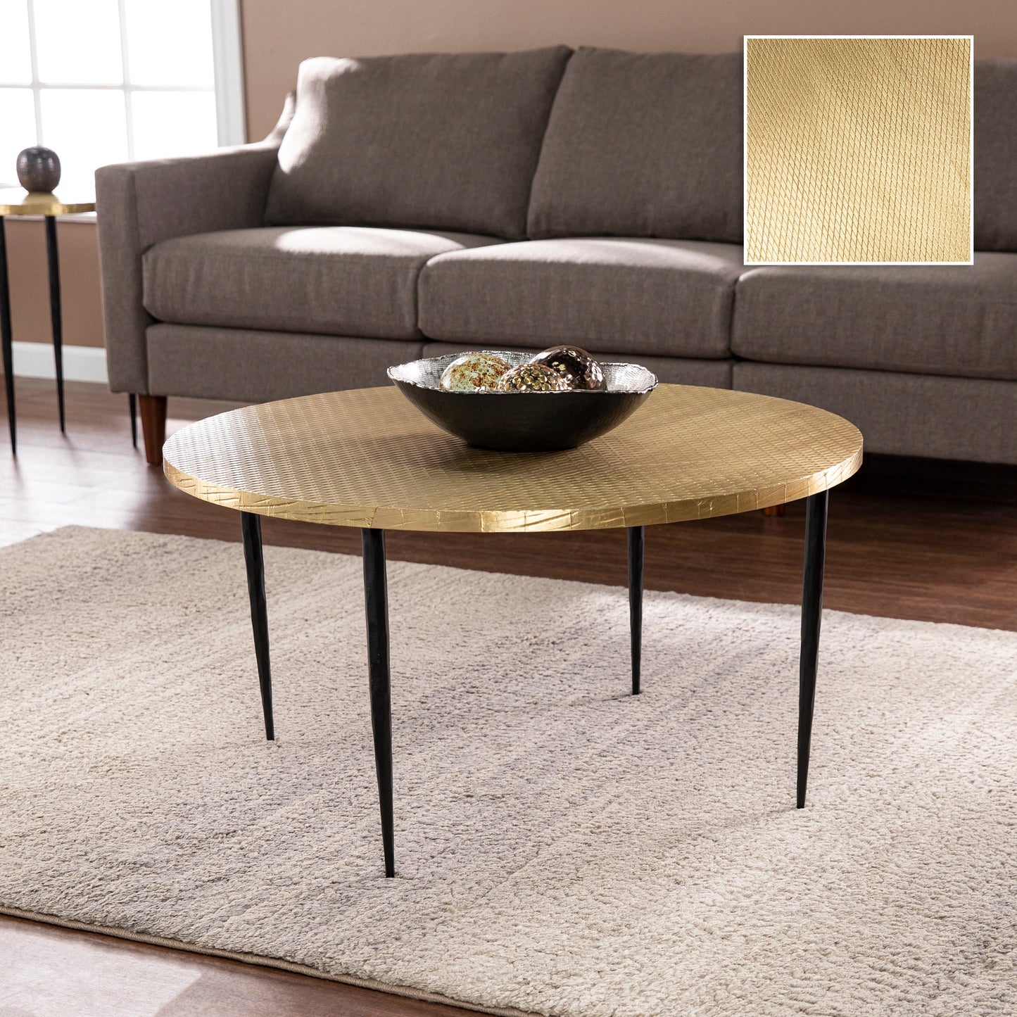 Round Cocktail Table with Embossed Top and Iron Legs