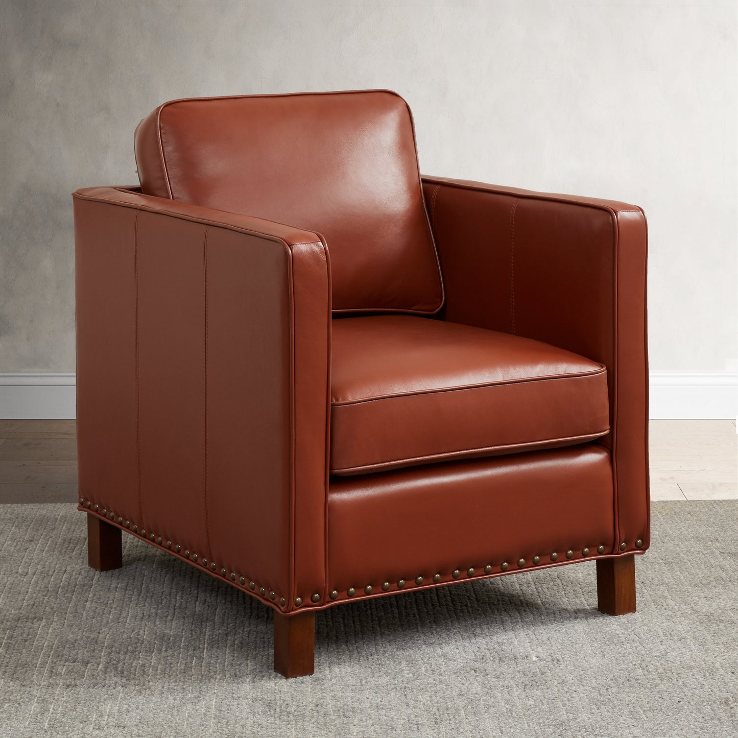 Upholstered Accent Chair with Nailhead Trim and Reversible Back Cushion