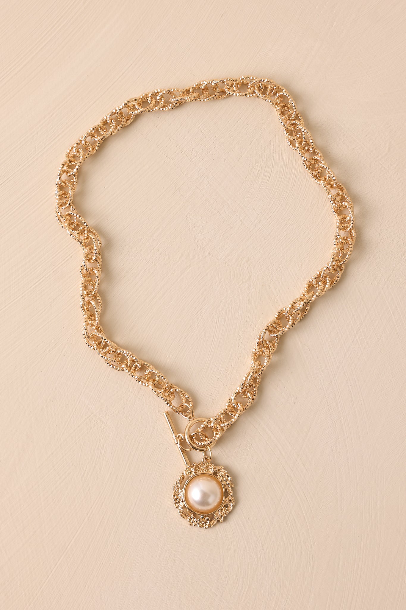 The World At Large Gold Chain Pearl Necklace