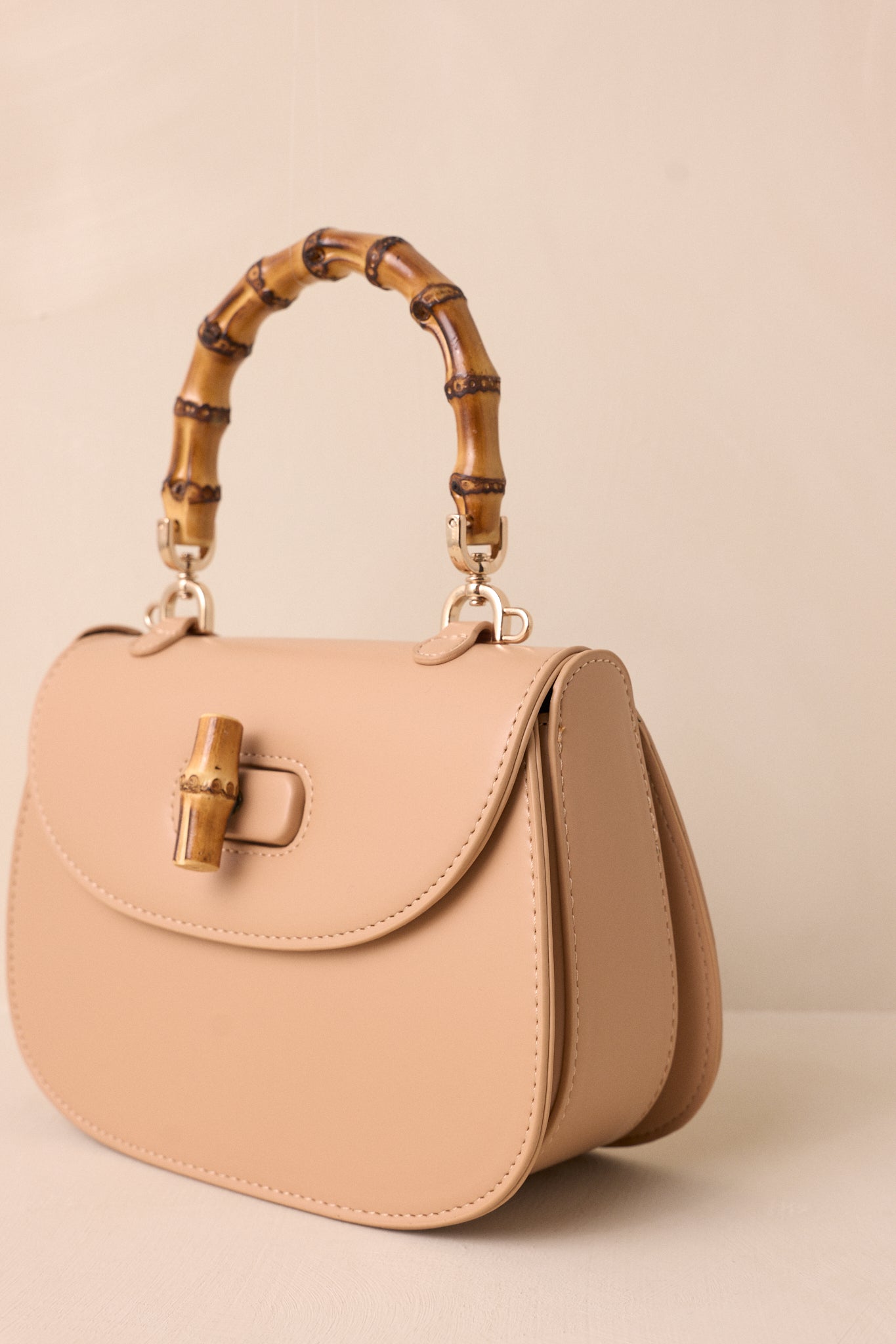 Whimsical Whirlwind Beige Bamboo Handle Handbag