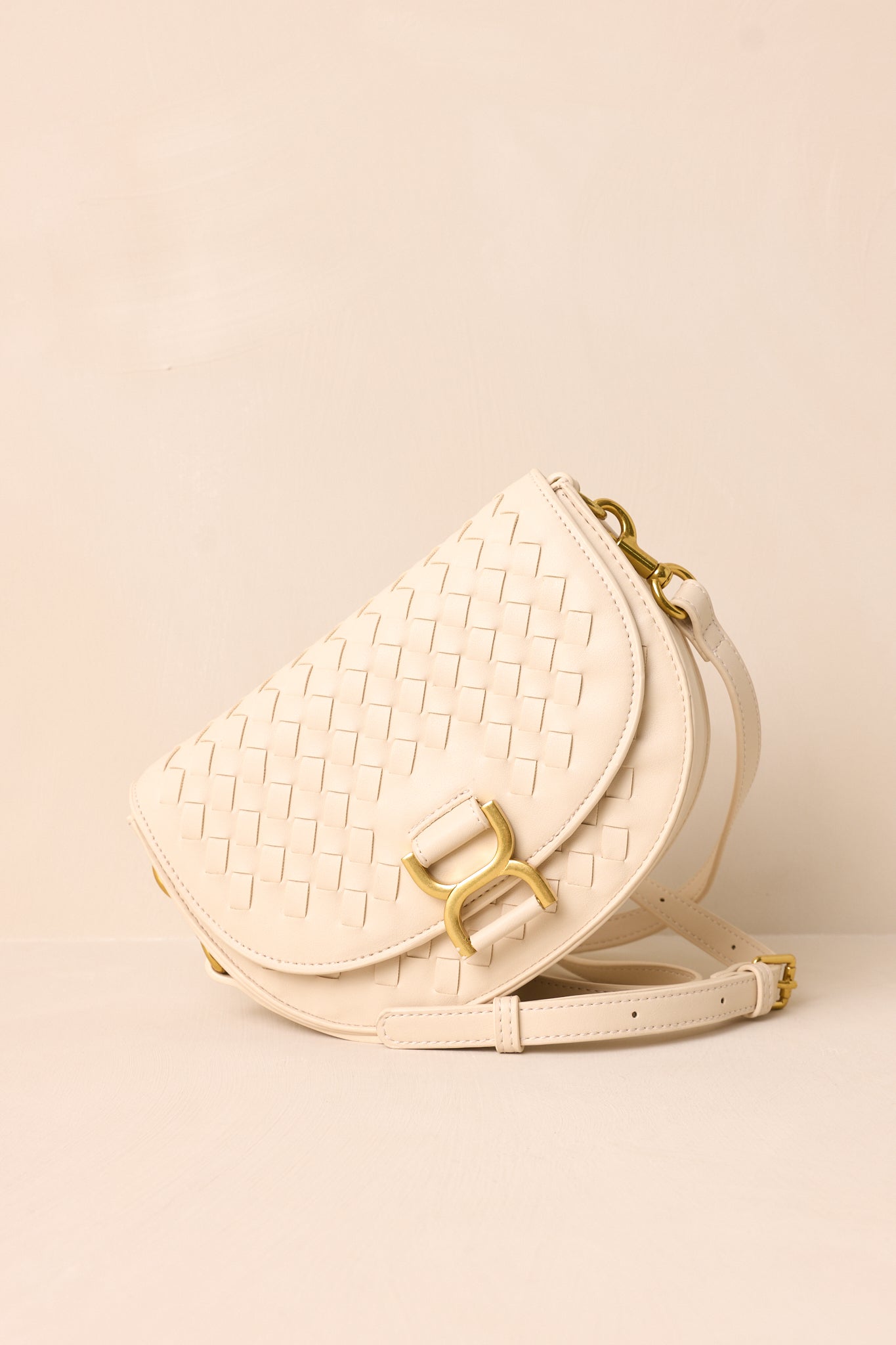 Tempest’s Call Beige Woven Faux Leather Handbag