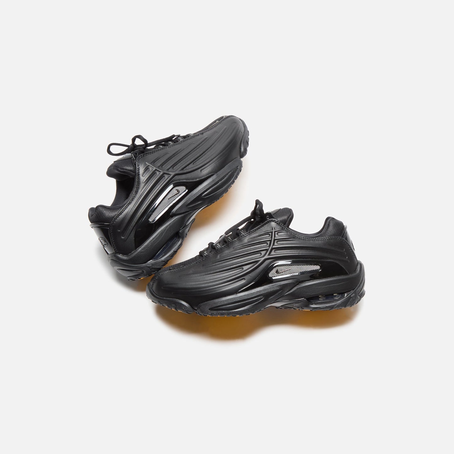 Nike x NOCTA Hot Step 2 - Black / Gunmetal / University Gold