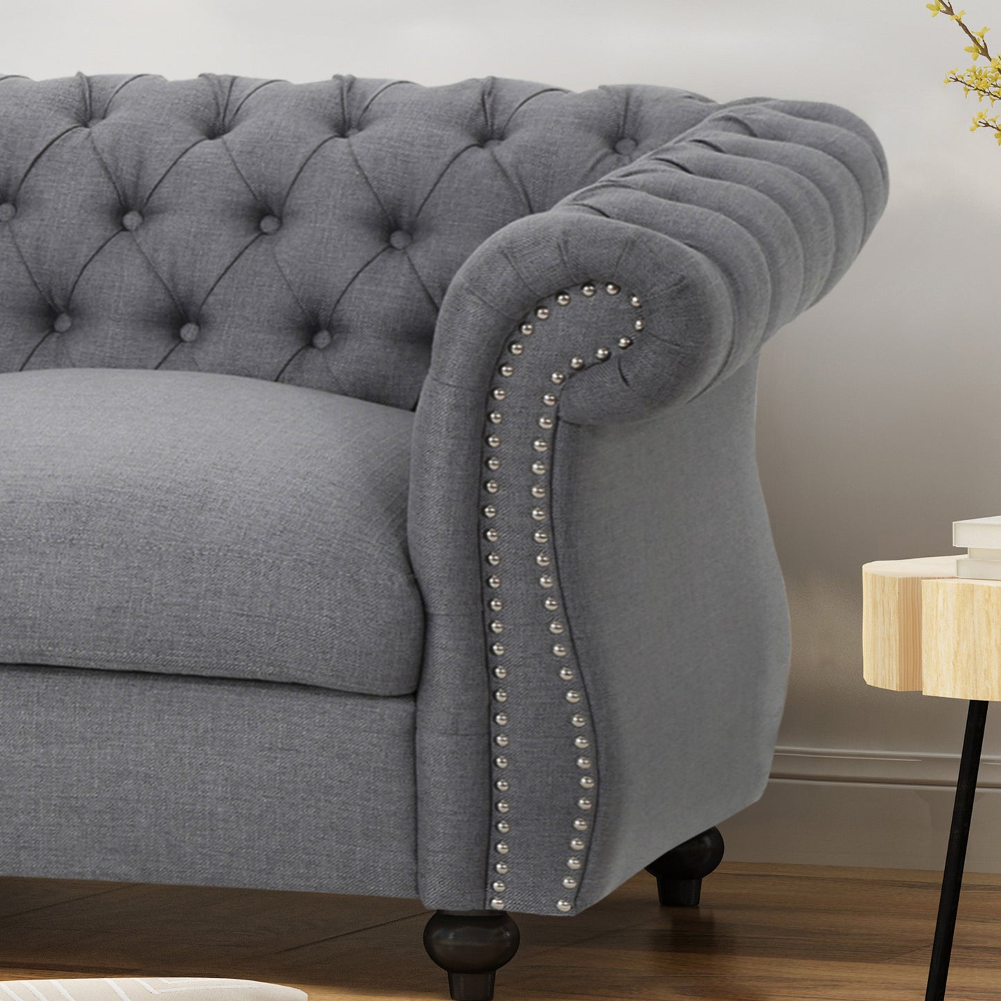 Quixotic Chesterfield Tufted Loveseat with Scroll Arms and Turned Legs