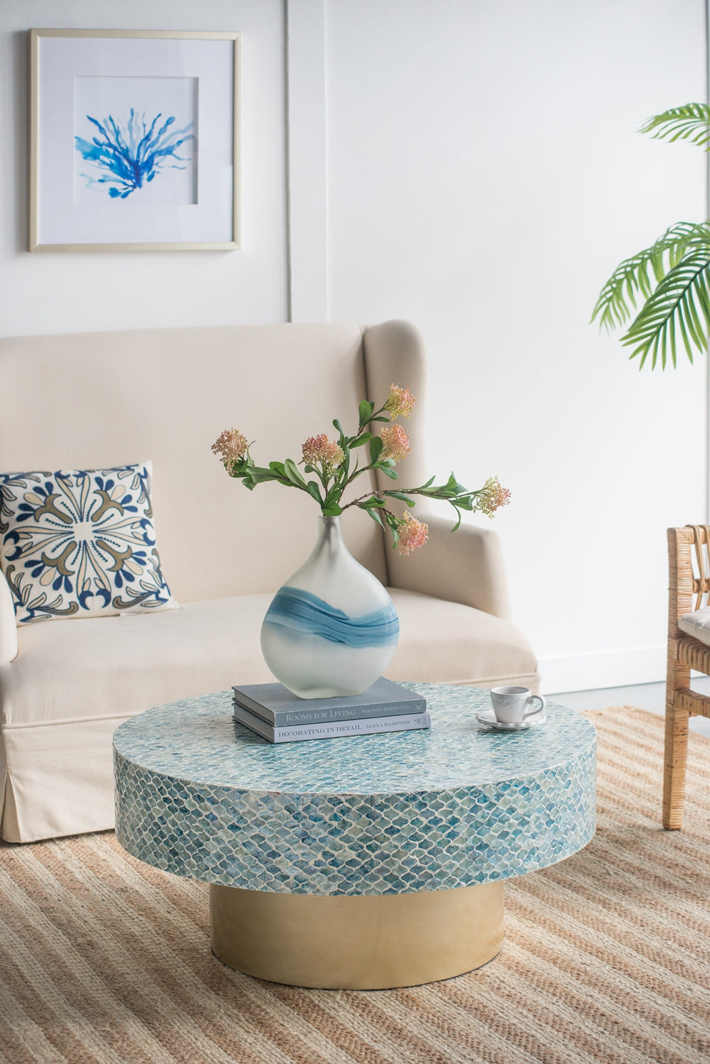 Alacrits Round Coffee Table with Capiz Design and Pedestal Base