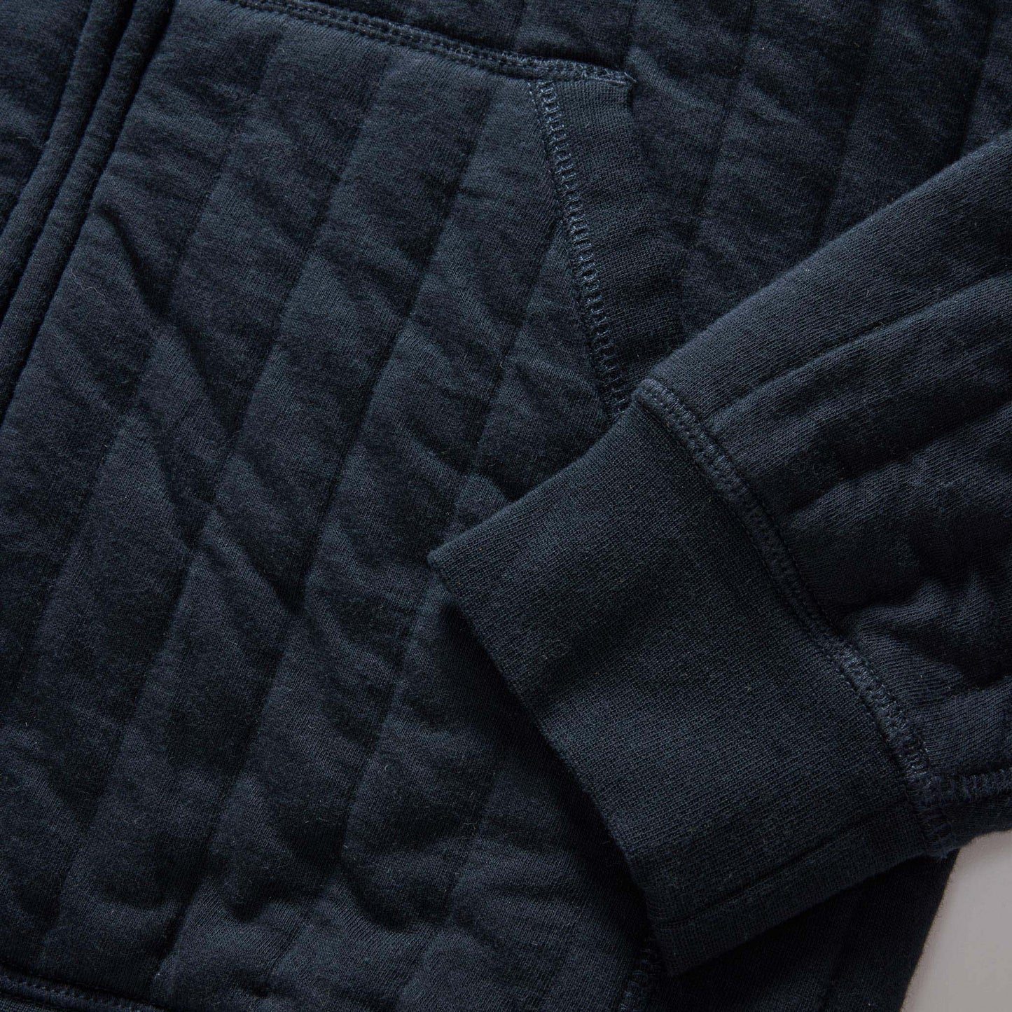 The Apres Zip Hoodie in Heather Midnight Quilted Jersey