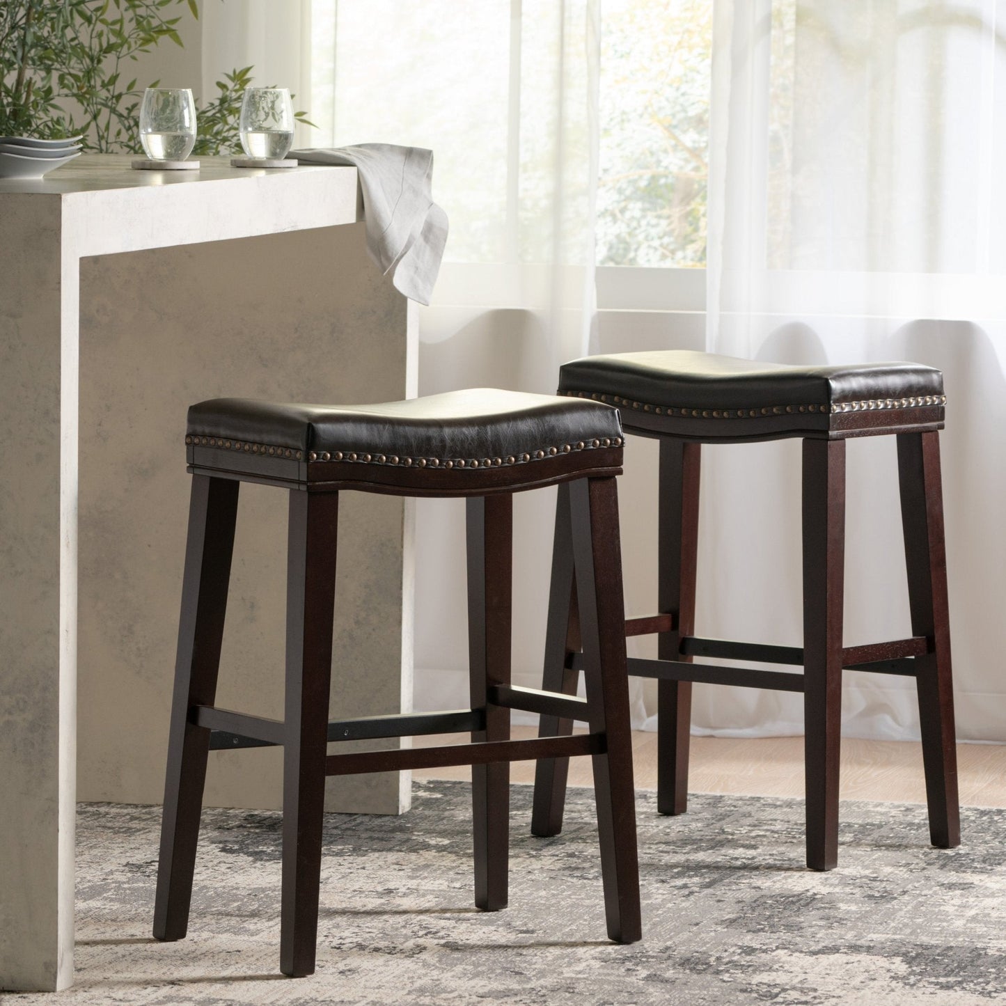 Leather Upholstered Saddle Bar Stool with Nailhead Trim