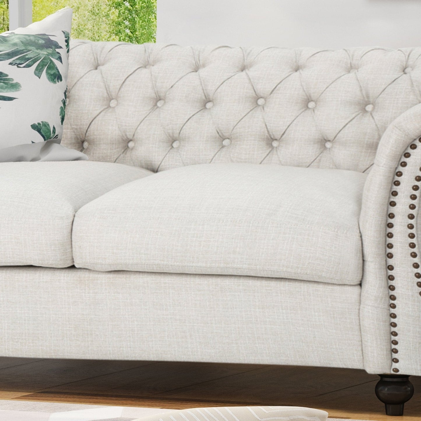 Quixotic Chesterfield Tufted Loveseat with Scroll Arms and Turned Legs