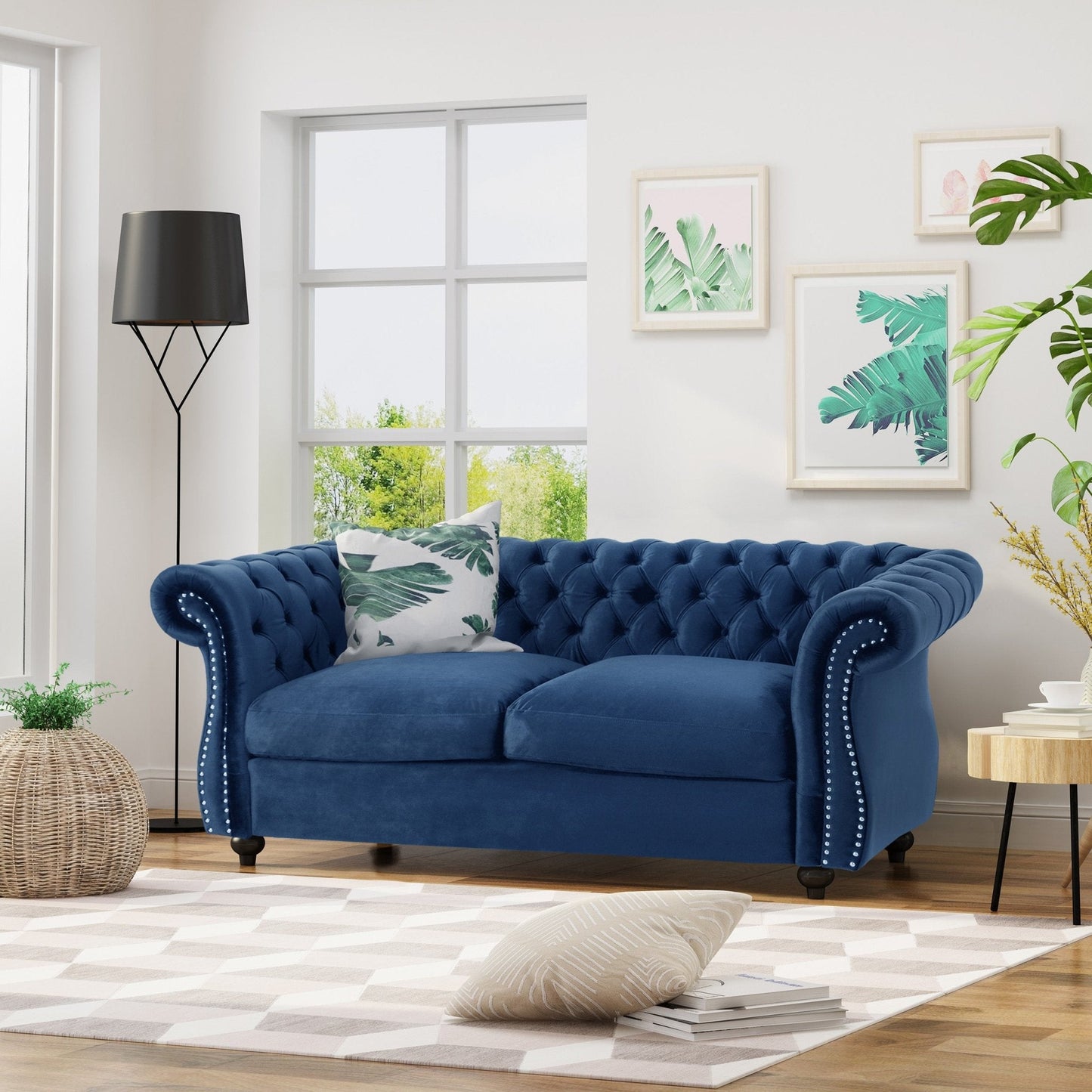 Quixotic Chesterfield Tufted Loveseat with Scroll Arms and Turned Legs