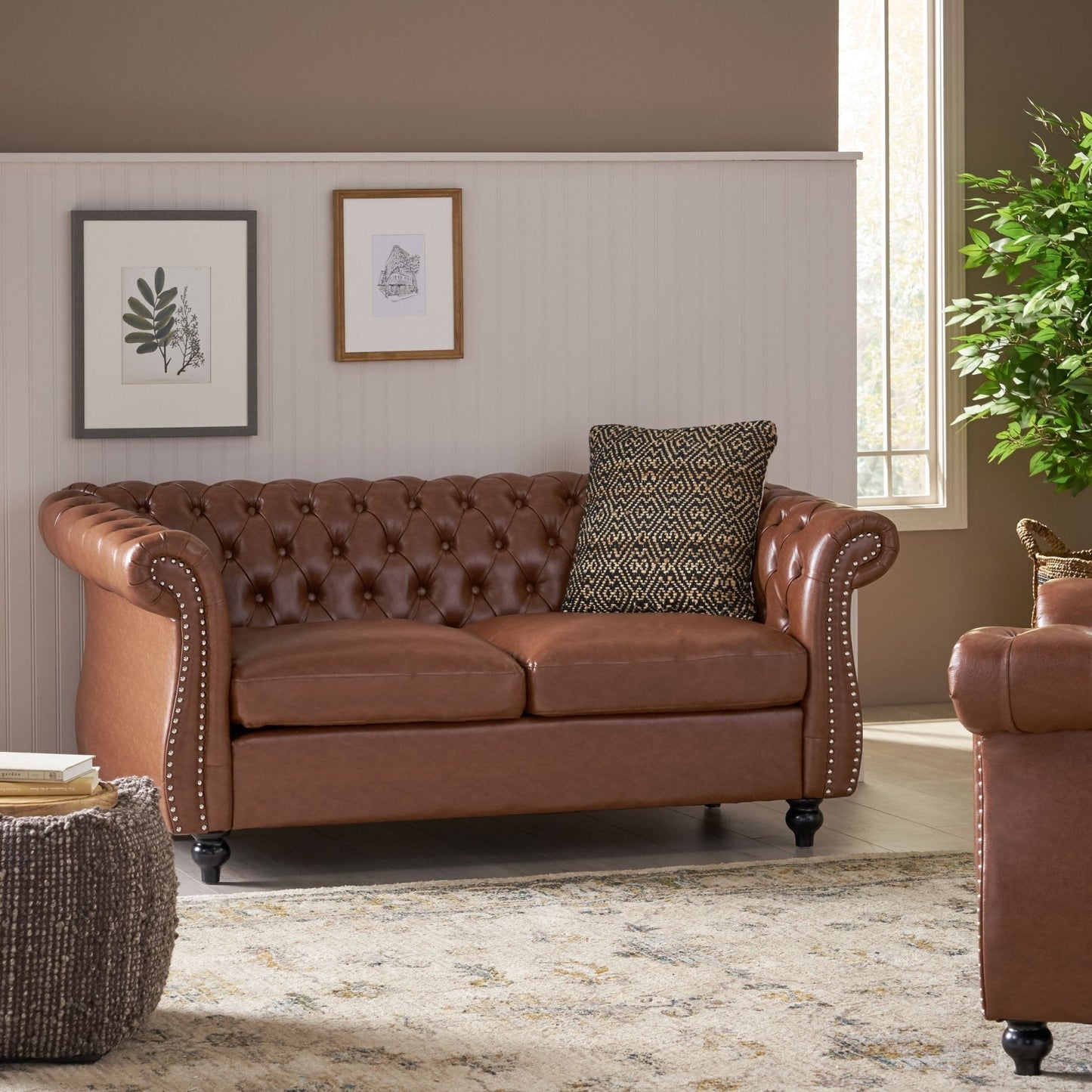 Quixotic Chesterfield Tufted Loveseat with Scroll Arms and Turned Legs