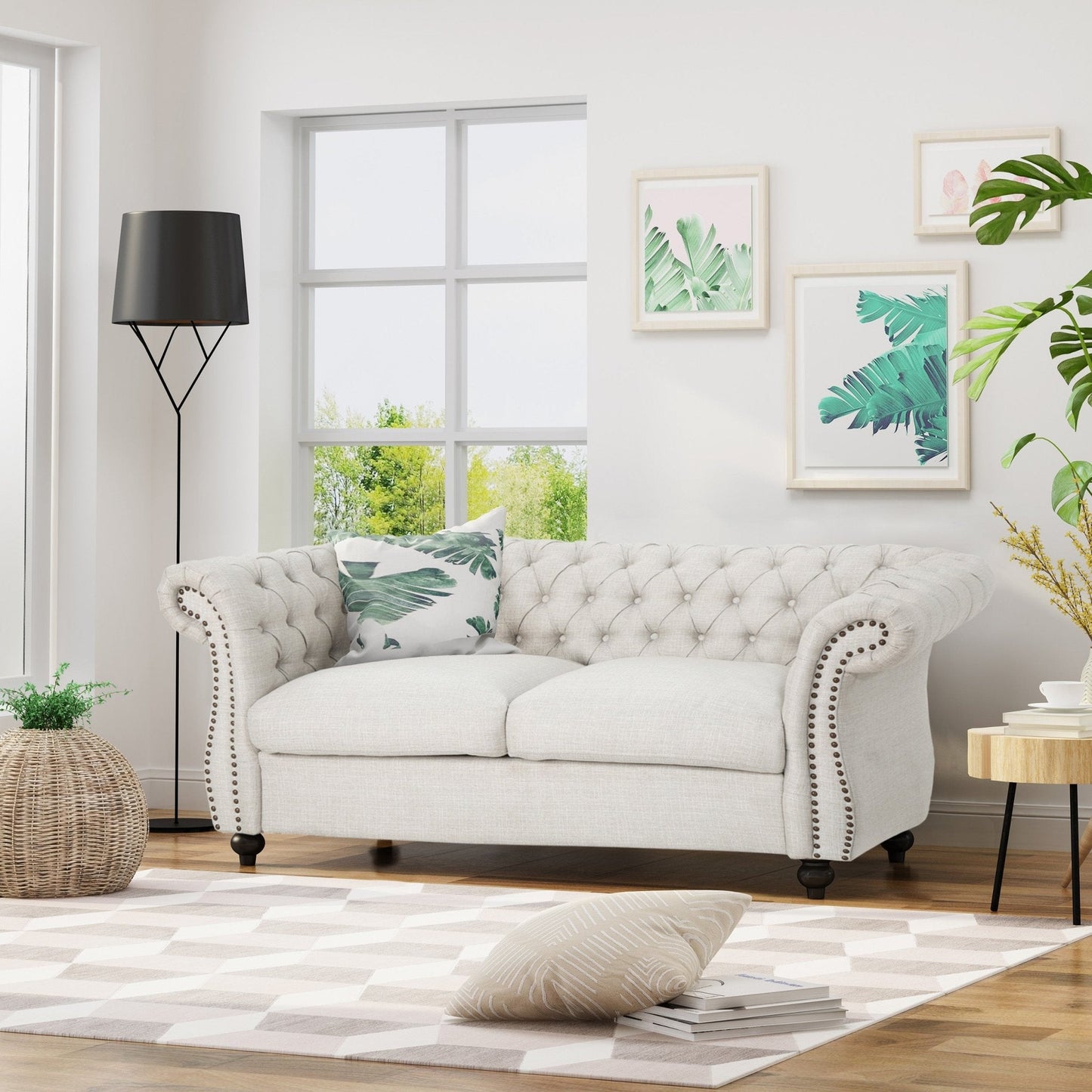 Quixotic Chesterfield Tufted Loveseat with Scroll Arms and Turned Legs