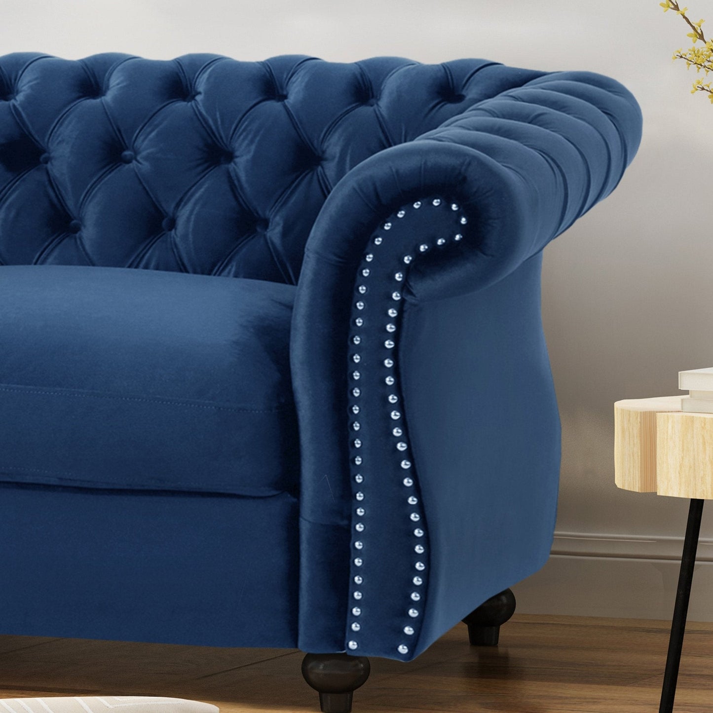 Quixotic Chesterfield Tufted Loveseat with Scroll Arms and Turned Legs